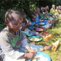 Kids Eating in Face Paint Kids Eating in Face Paint